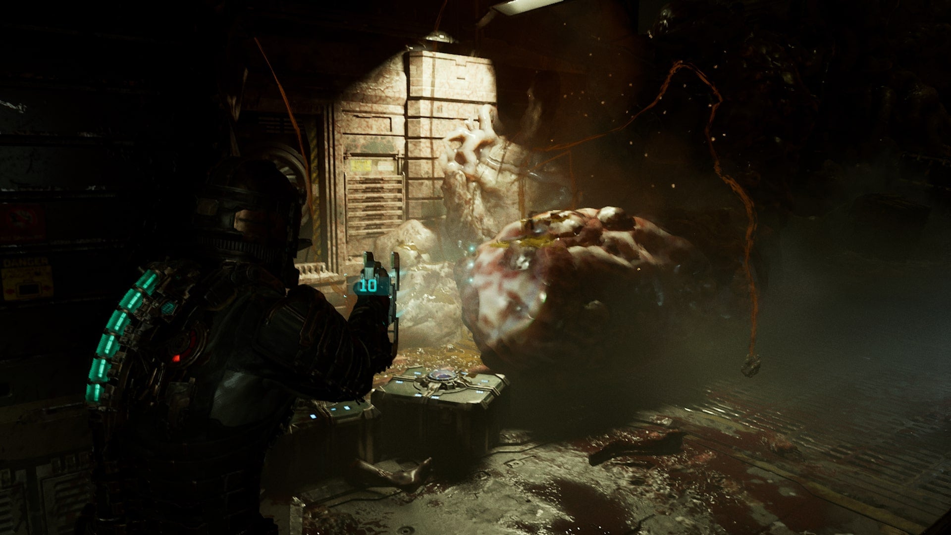 Isaac aims at a tendril in Dead Space
