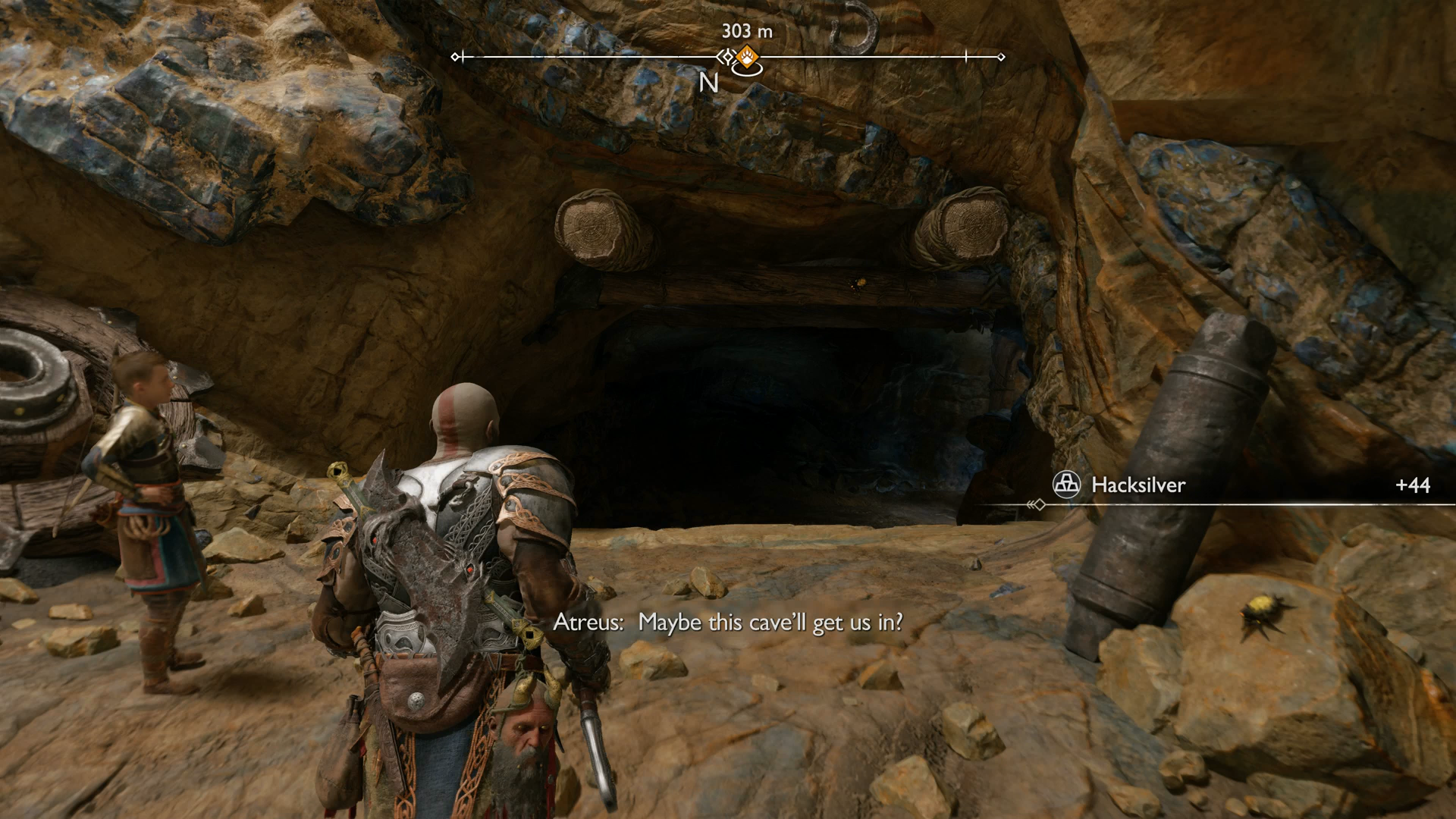 Kratos and Atreus descend through a hole into The Applecore