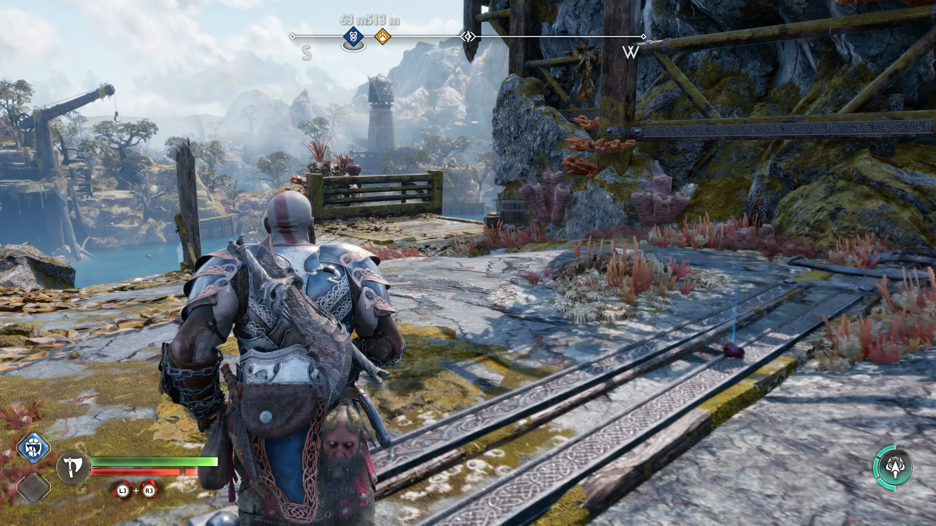Kratos slips through a newly created path on Lyngbakr Island in God of War Ragnarok