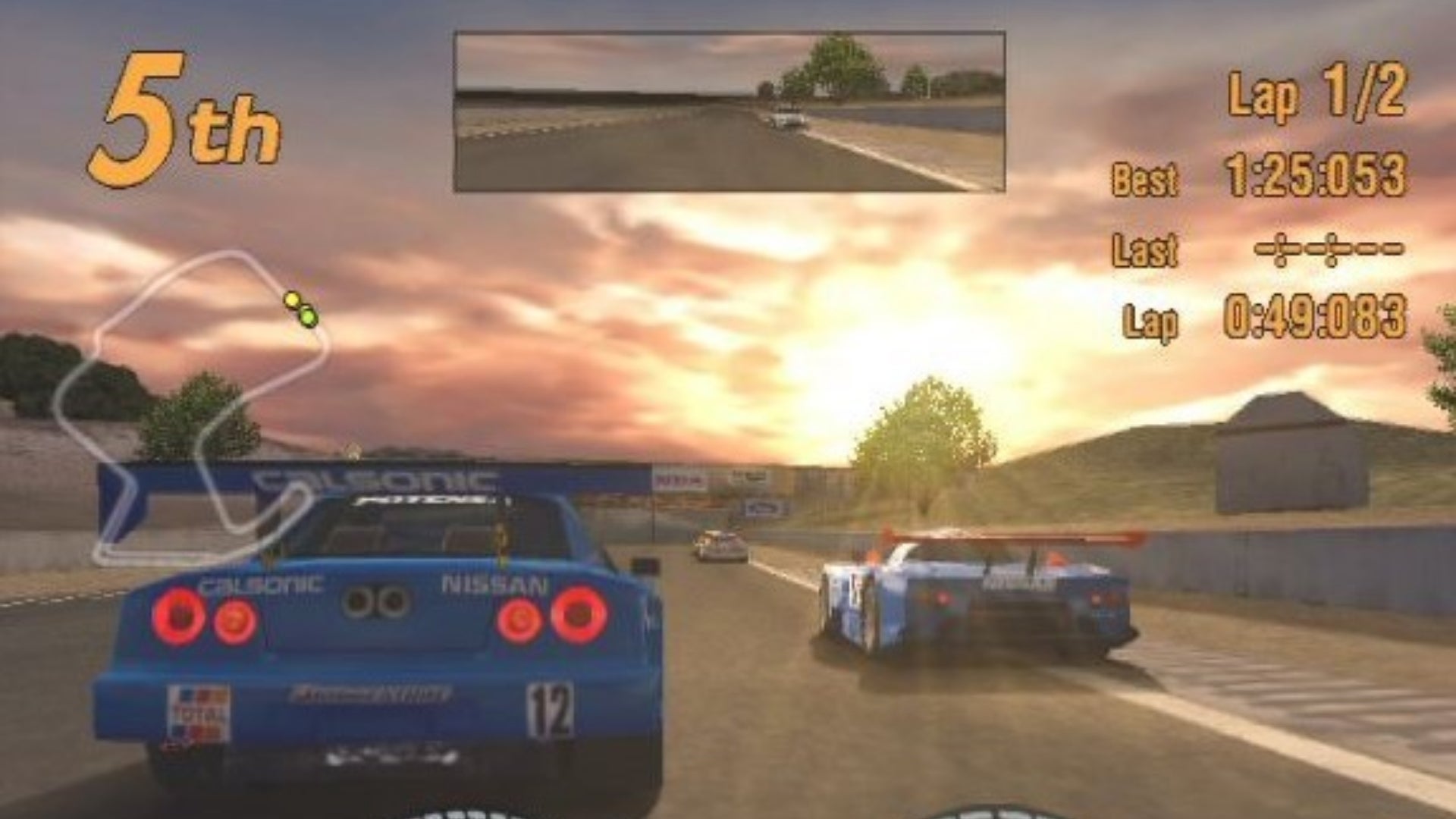 Multiple cars race one another in Gran Turismo 3, with the player being 5th