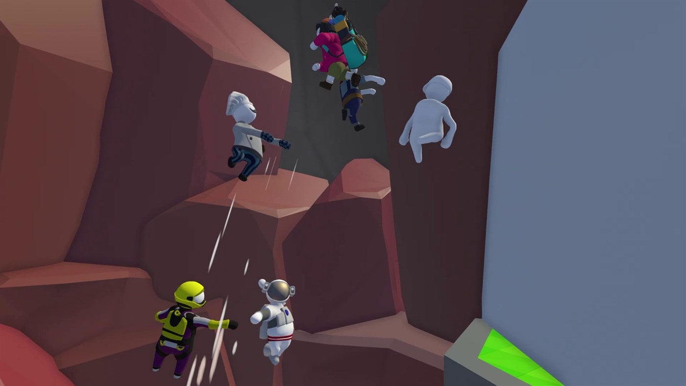 Sekelompok pemain kooperatif mencoba bermanuver ke atas gunung di Human Fall Flat.