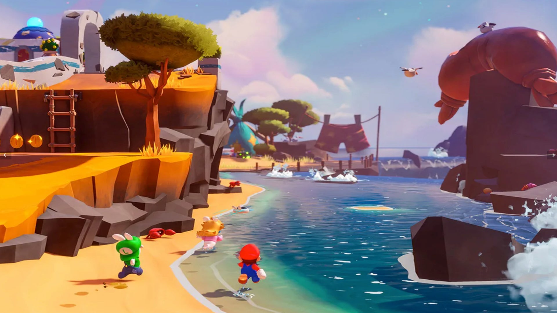 Mario, Rabbid Peach, and Rabbid Luigi run along a beach in Mario + Rabbids Sparks of Hope.