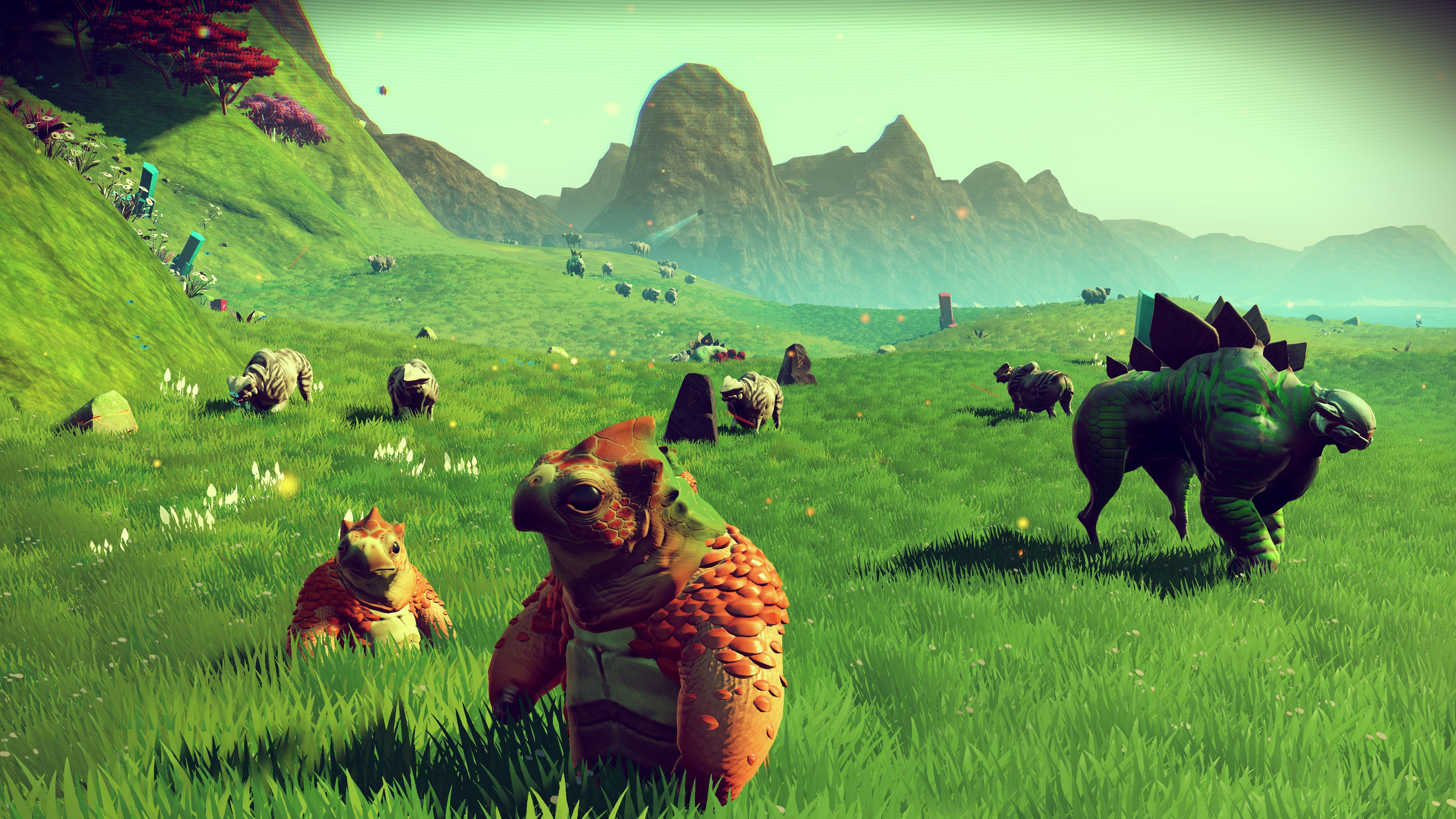A lush, green world full of alien animals in No Man's Sky