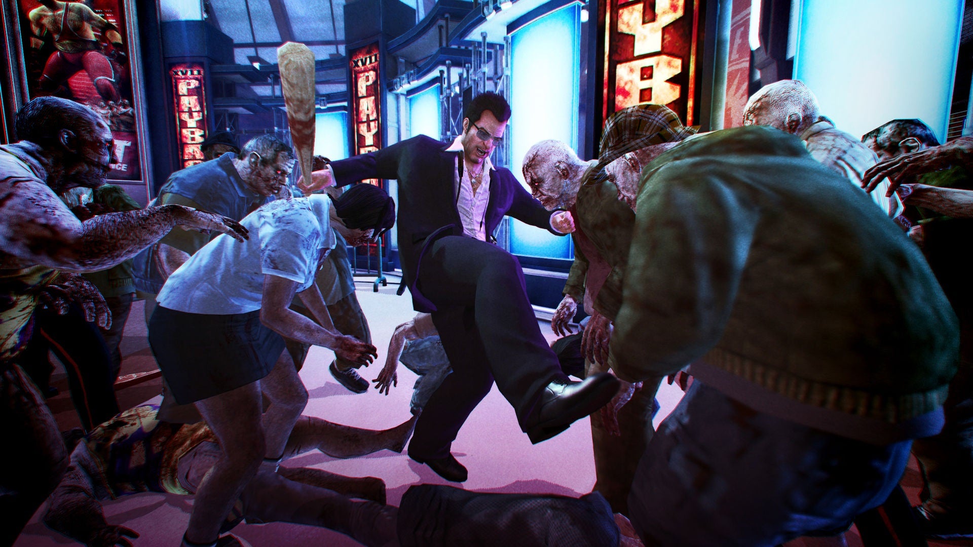 Frank West fighting off zombies in Dead Rising 2