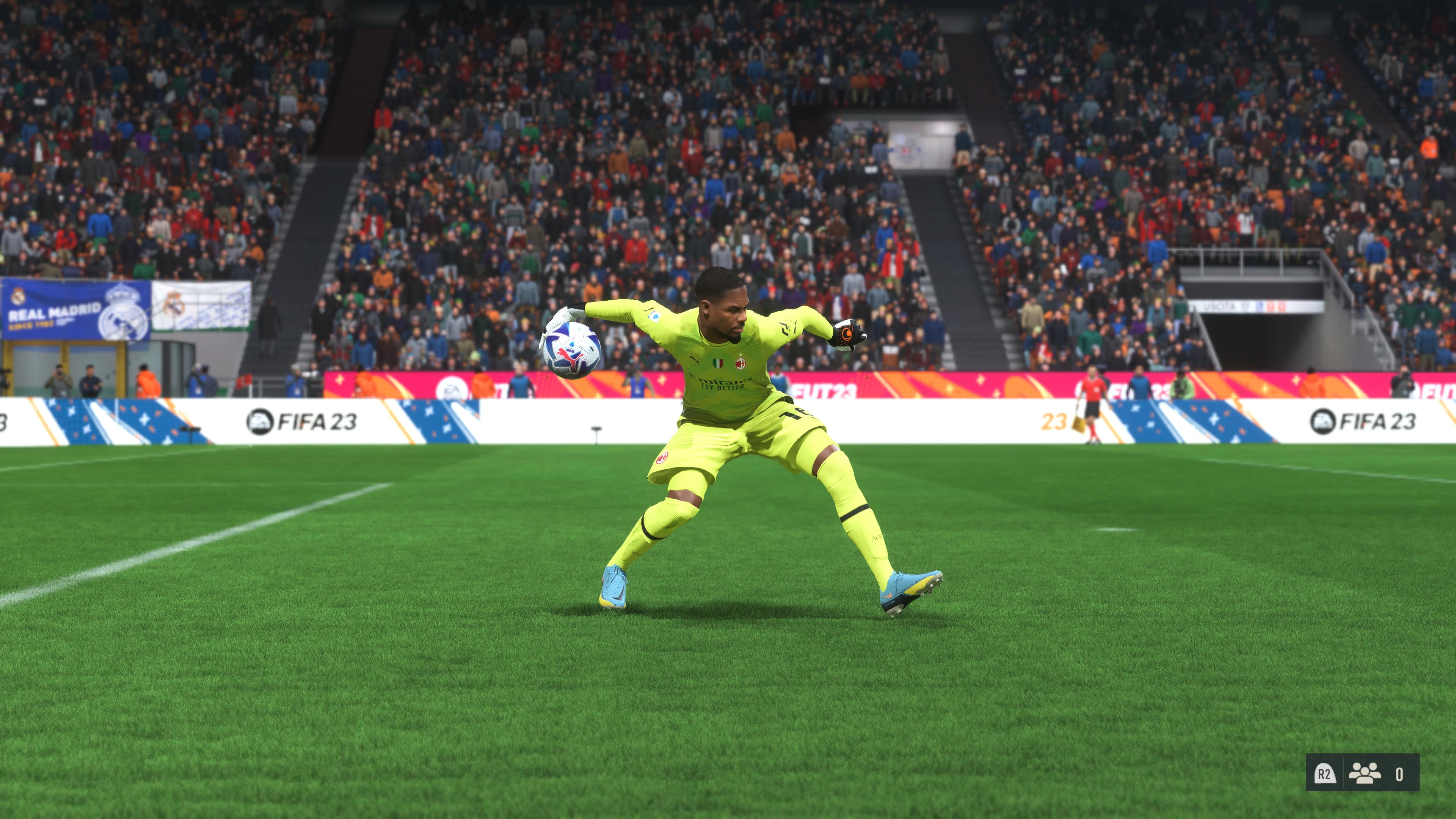 Mike Maignan, one of the best goalkeepers in FIFA 23, rolling the ball out to one of his defenders