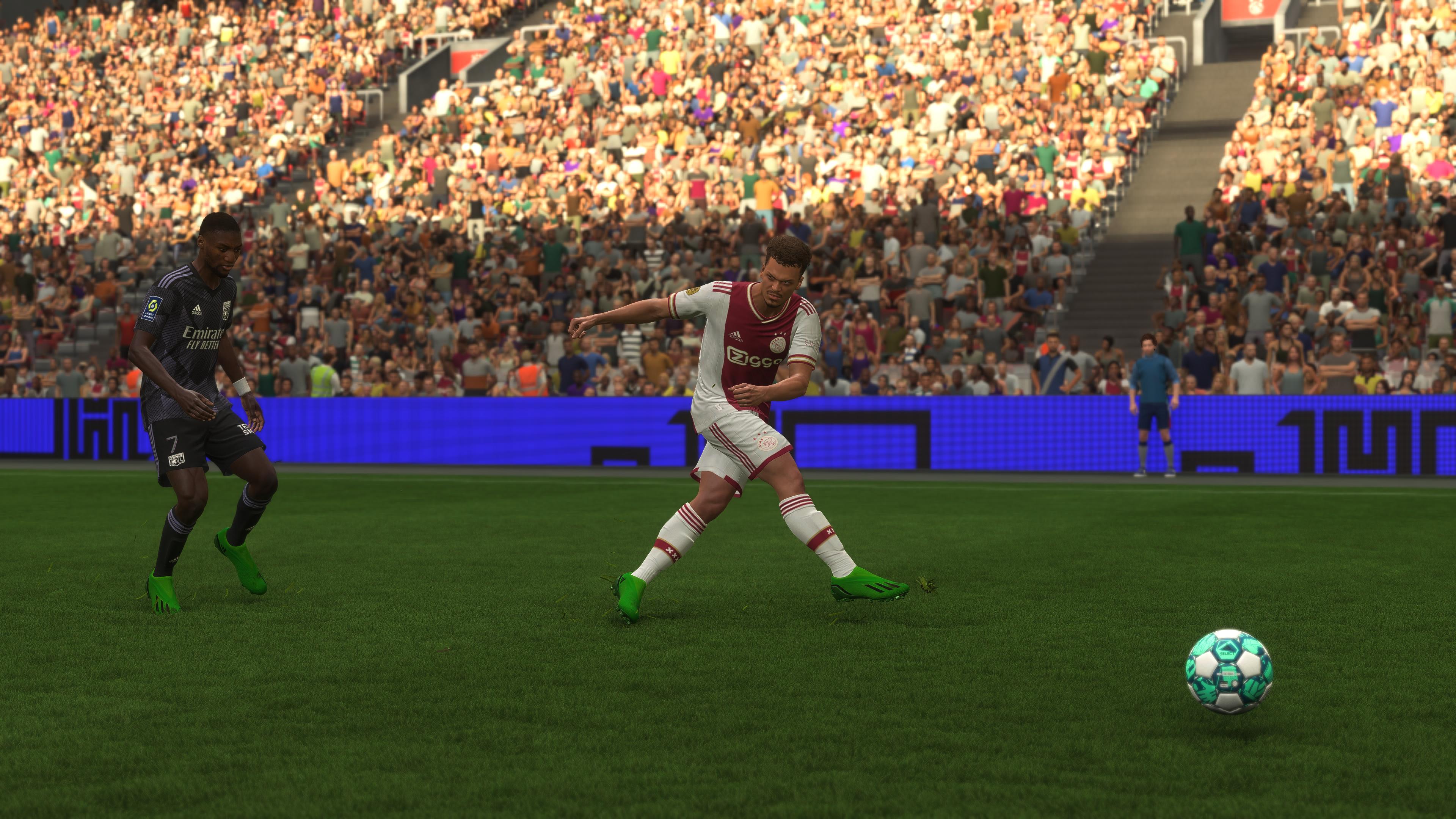 One of the best Ajax midfielders in FIFA 23 striking the ball back to the goalkeeper