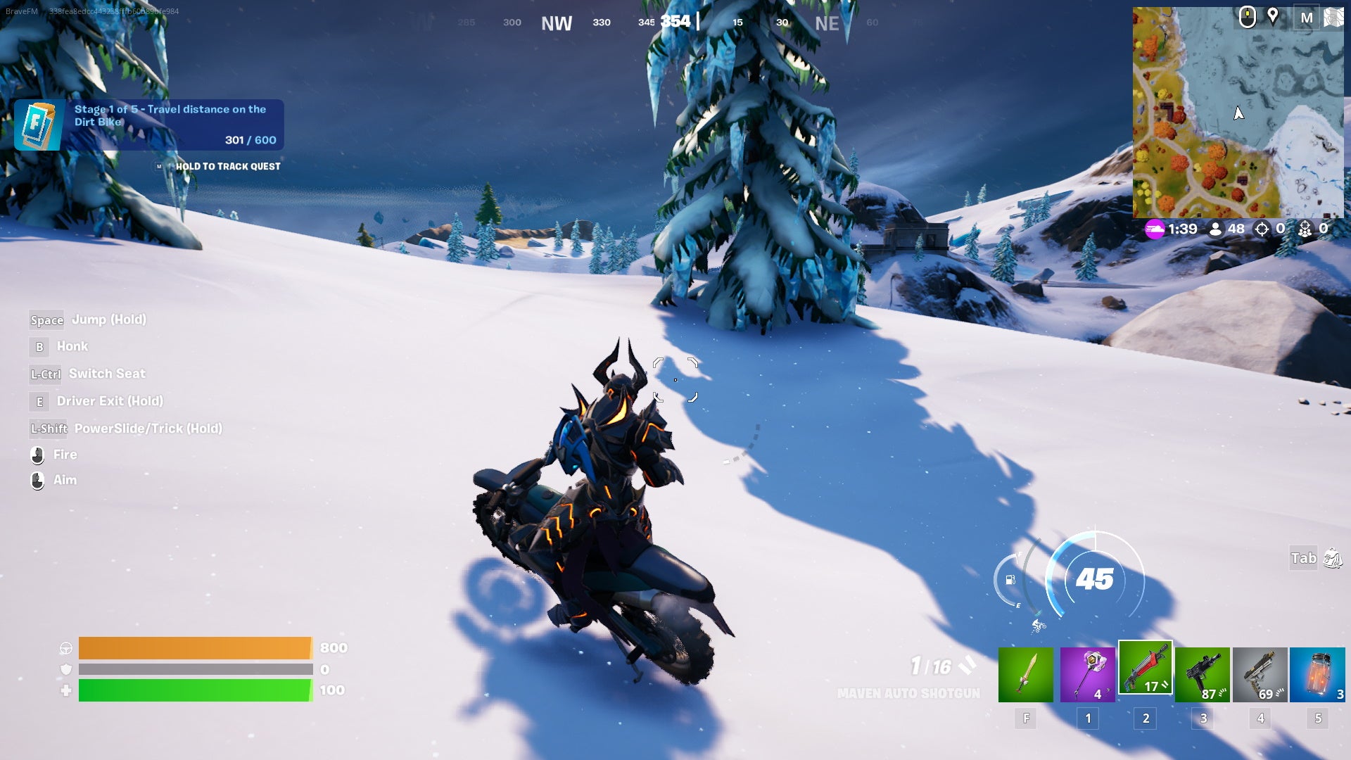 Fortnite dirt bike locations: An animated character in spiky black armor is riding a motorcycle across a snowy hill. He is aiming a shotgun at a tree.