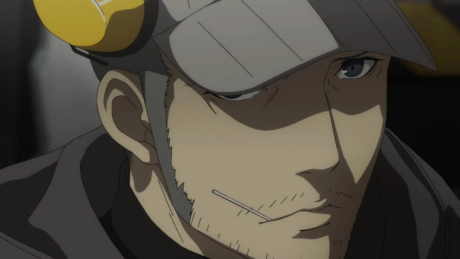 Persona 5 Royal Iwai Confidant: An anime man in a grey hat and trench coat stares offscreen with a serious expression on his face