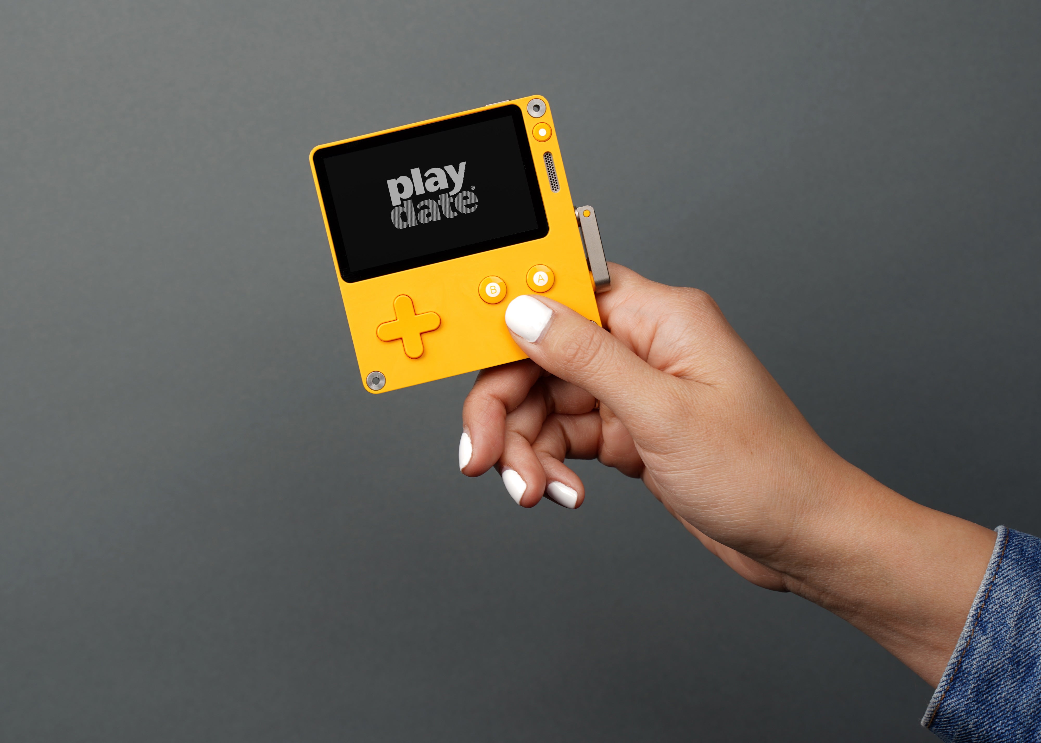 Playdate is a new handheld with black and white screen and a crank ...