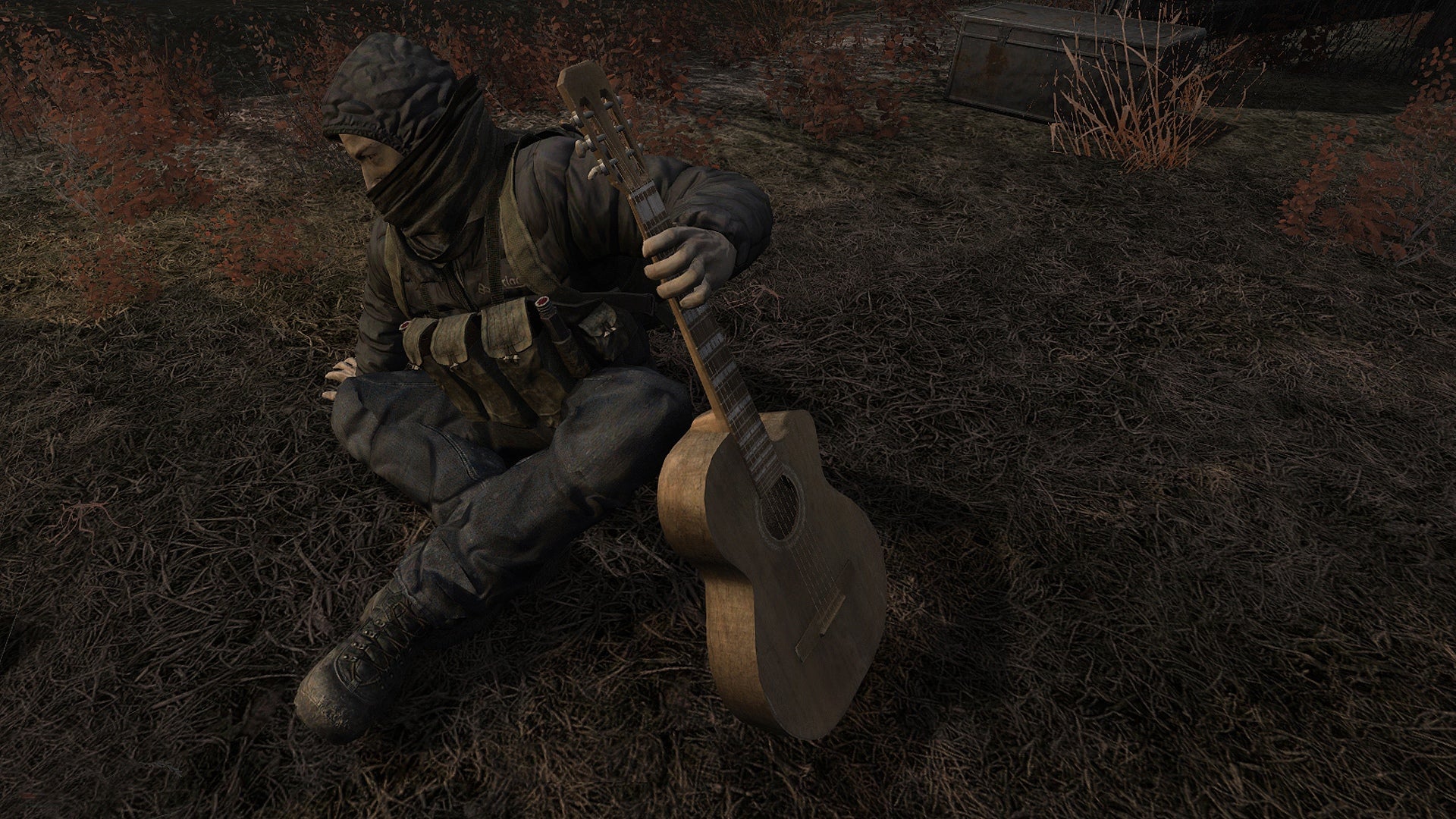 Player looks down at an NPC sat on the ground with a guitar in fan made overhaul mod for STALKER: Shadow of Chernobyl.