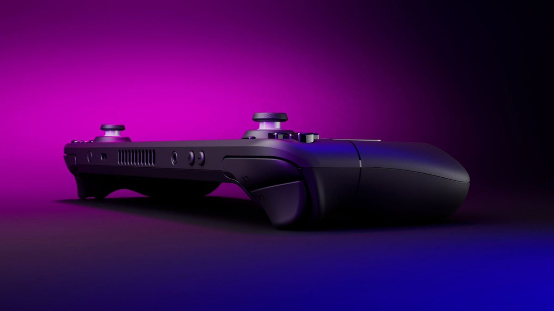 The Steam Deck, a handheld console, can be seen with a purple and blue backdrop.