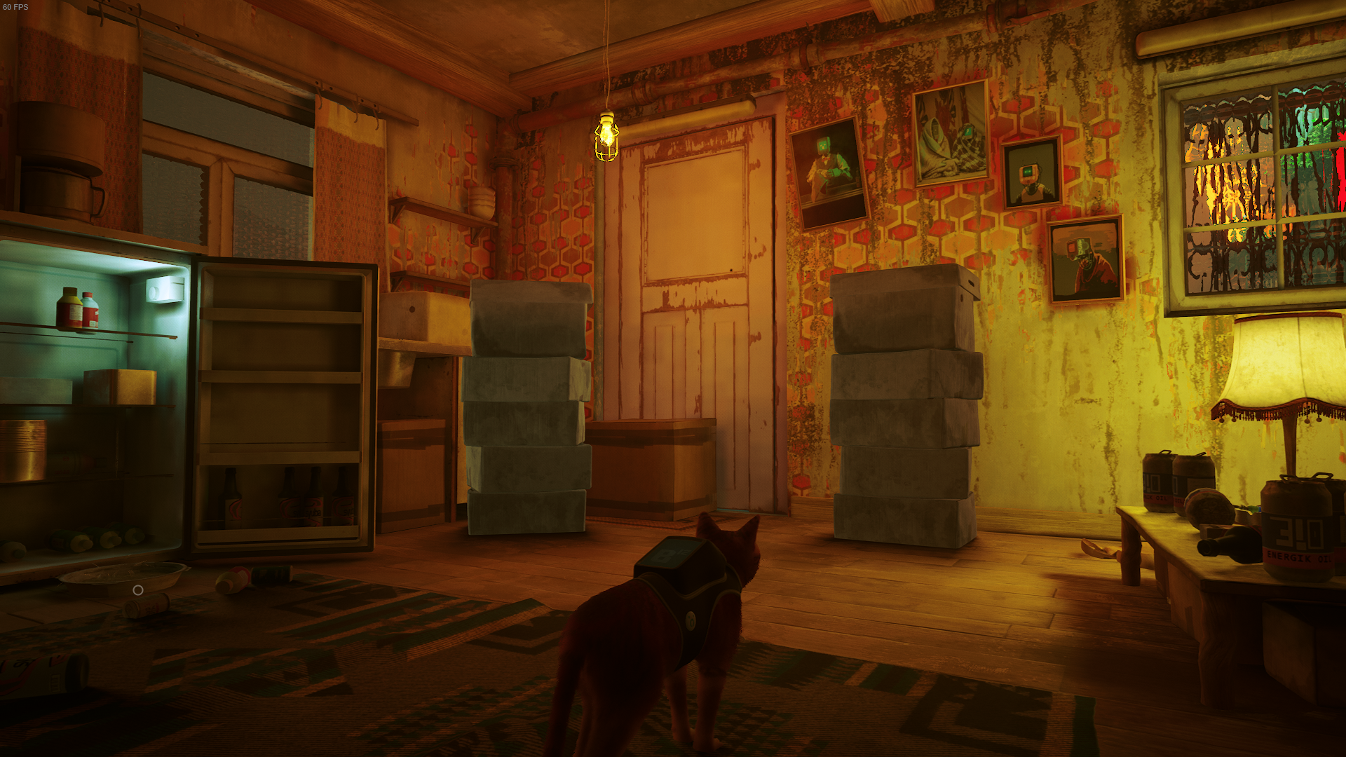 The cat of Stray looks at two piles of boxes in Zbaltazar's flat.