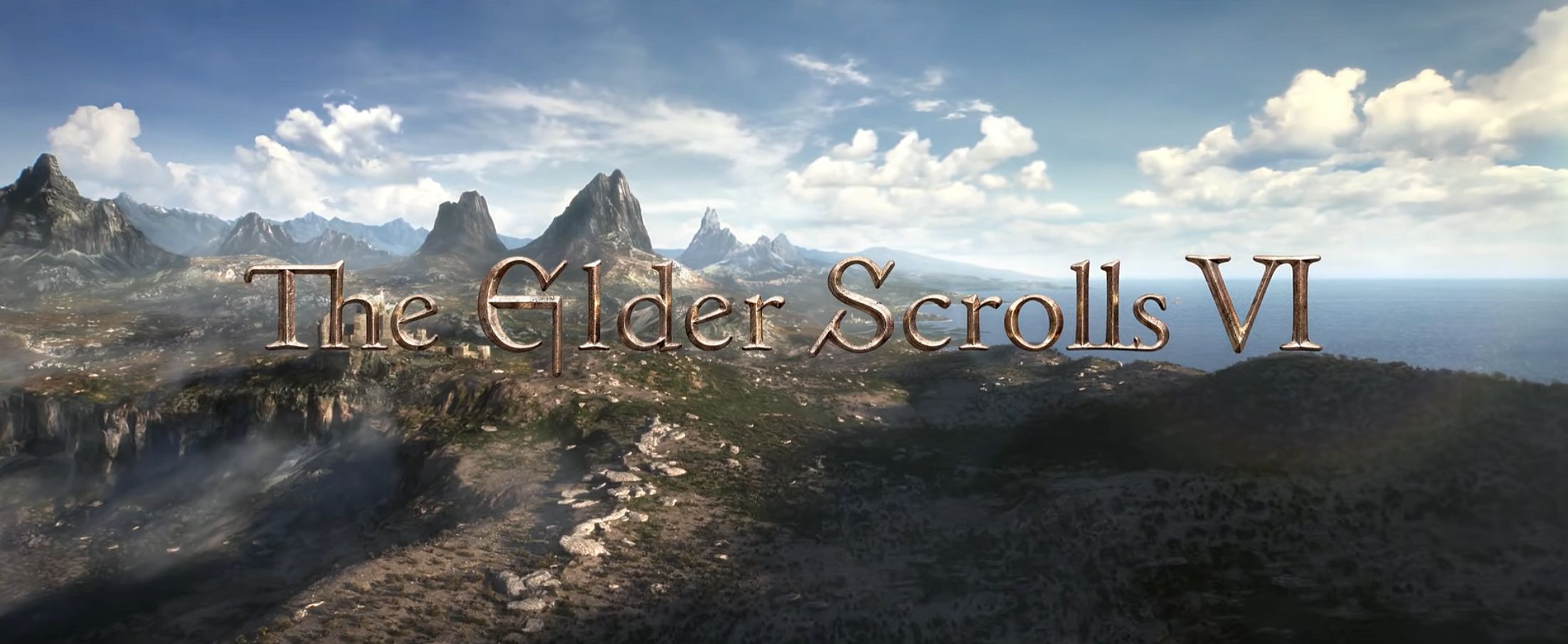 The landscape of Tamriel, showing the mountains against the sky, with the text "The Elder Scrolls VI" written over the top of it