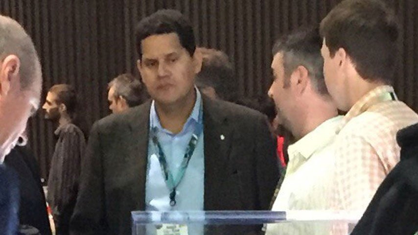 Image for Let's enjoy this incredible photo of Nintendo's Reggie Fils-Aime looking at the Xbox S